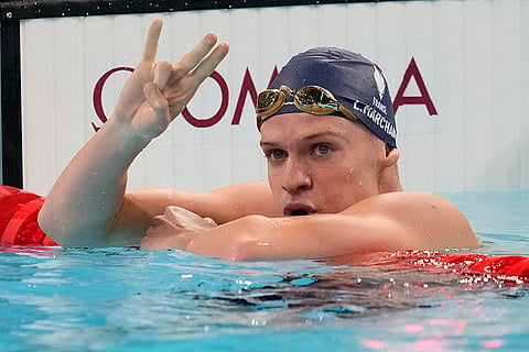 Leon Marchand reacts after winning 200-meter final